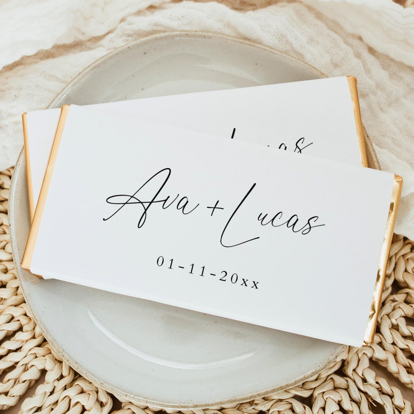 Chocolate bar with a customized white wrapper that has the name of a couple andt their wedding date