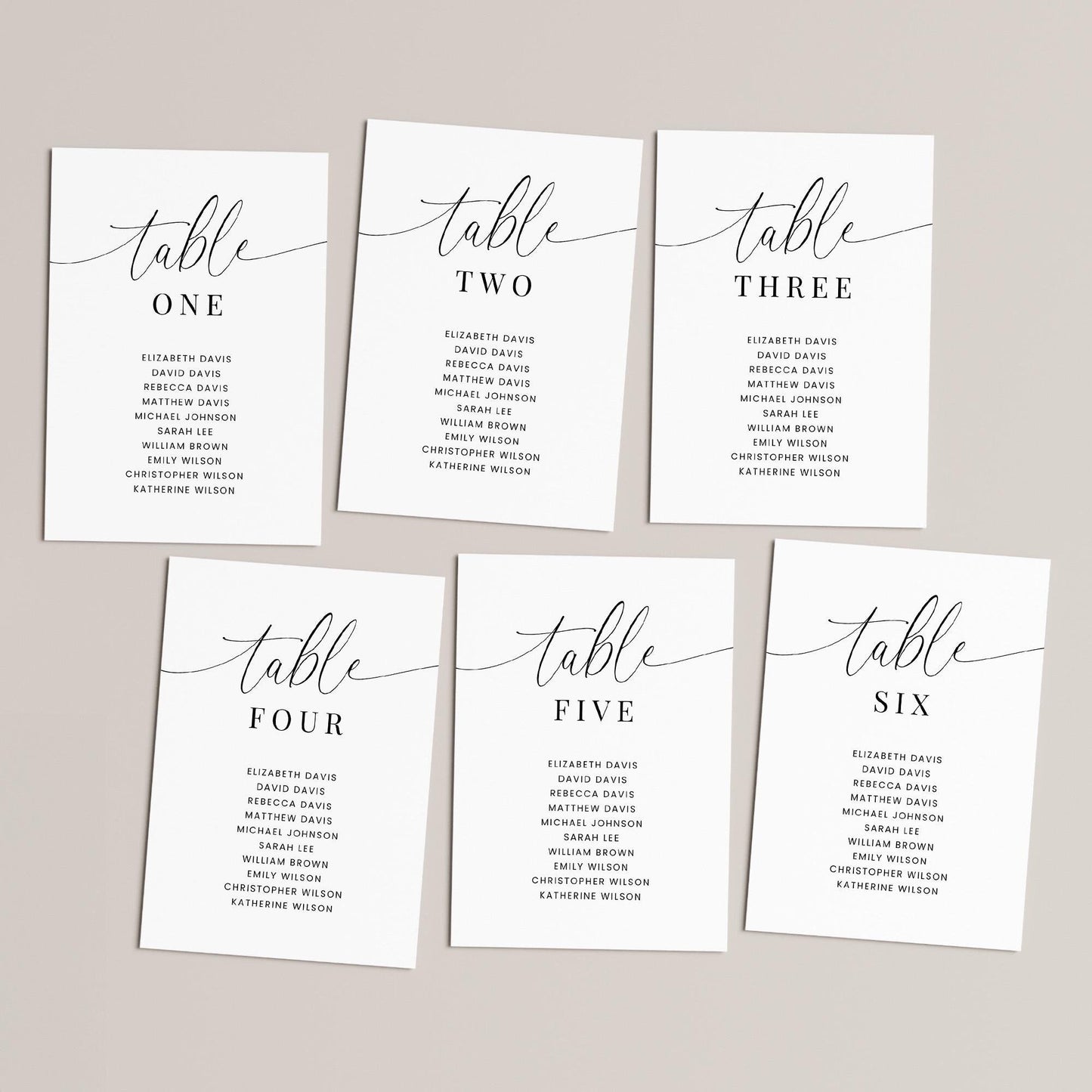 Table number seating chart cards with a calligraphy font for the word 'table', the table number and then a list of guest names underneath in a minimalistic style