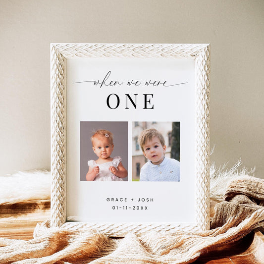 Table number cards featuring the text &#39;when we were&#39; followed by the number one, and a photo of each member of the couple when they were one